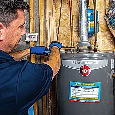 ZPZ tech fixing pipe on hot water heater