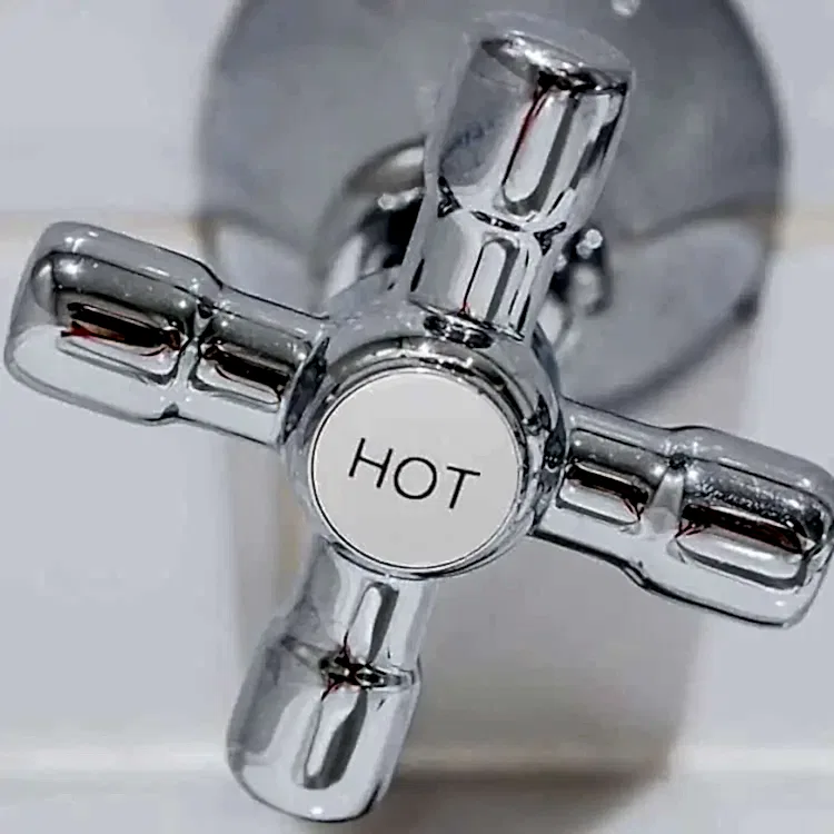 Hot Water Nozzle Stock Photo for Hot Water Heater Plumbing Services
