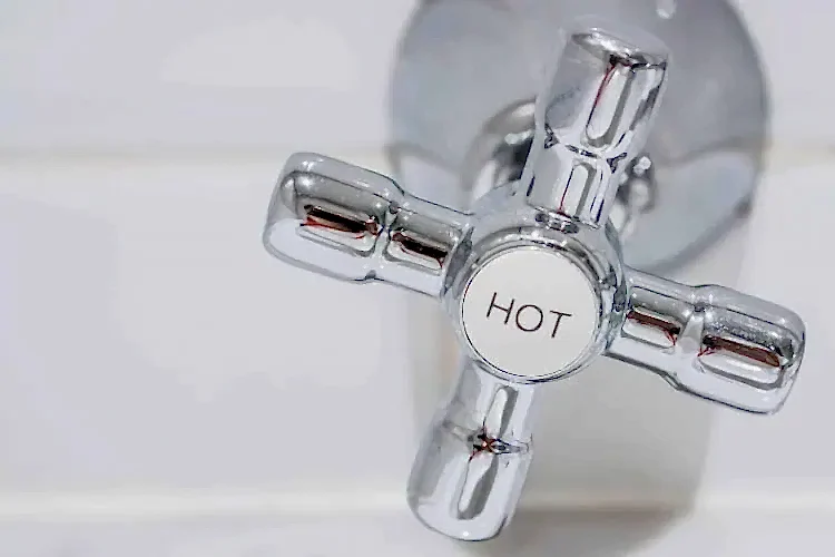 Hot Water Nozzle Stock Photo for Hot Water Heater Plumbing Services