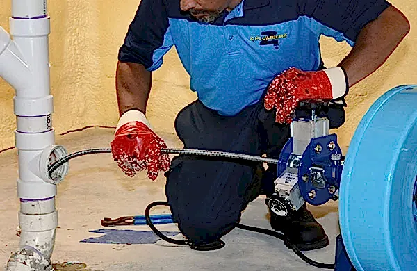 Z PLUMBERZ of North America servicing floor drain