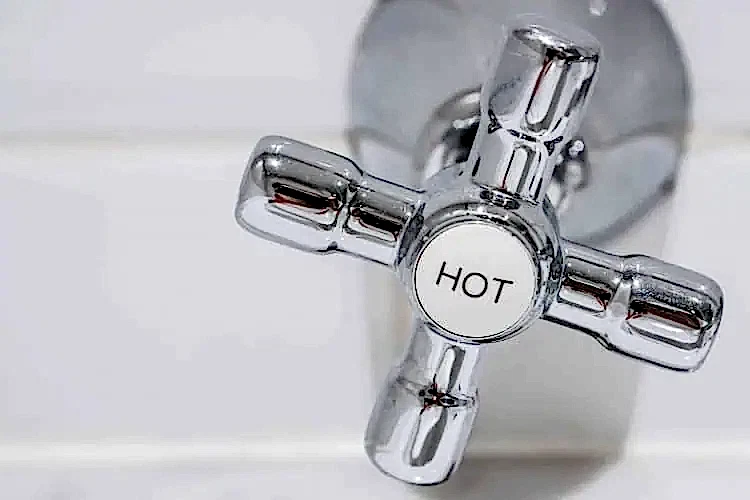 Hot Water Nozzle Stock Photo for Hot Water Heater Plumbing Services