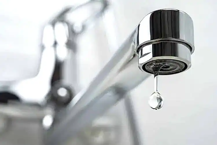 Dripping Faucet Stock Photo for Sink Services