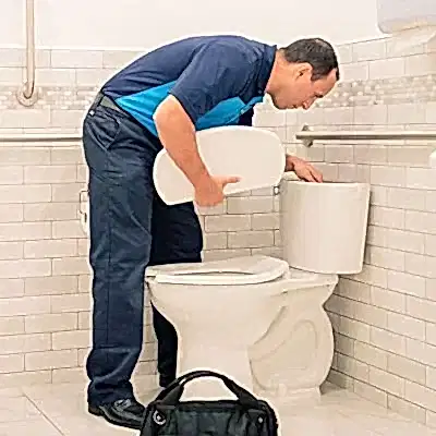 ZPZ Tech checking toilet top