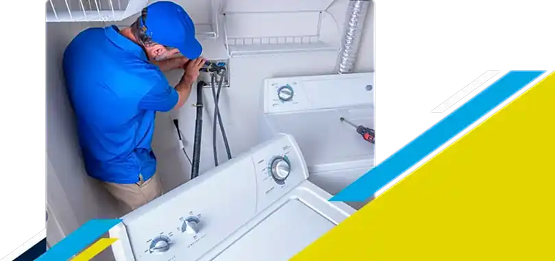 Z PLUMBERZ technician adjusting washing machine water intake
