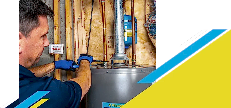 Z PLUMBERZ technician fixing water heater
