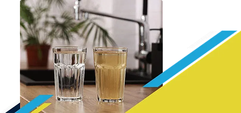 Two glasses full of water with one being clean and other dirty