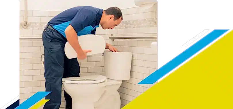 Z PLUMBERZ of Palm Beach technician inspecting top chamber of a toilet