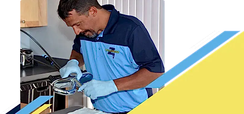 Z PLUMBERZ of Palm Beach technician inspecting sink faucet assembly
