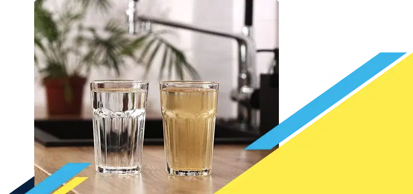 Two glasses full of water with one being clean and other dirty