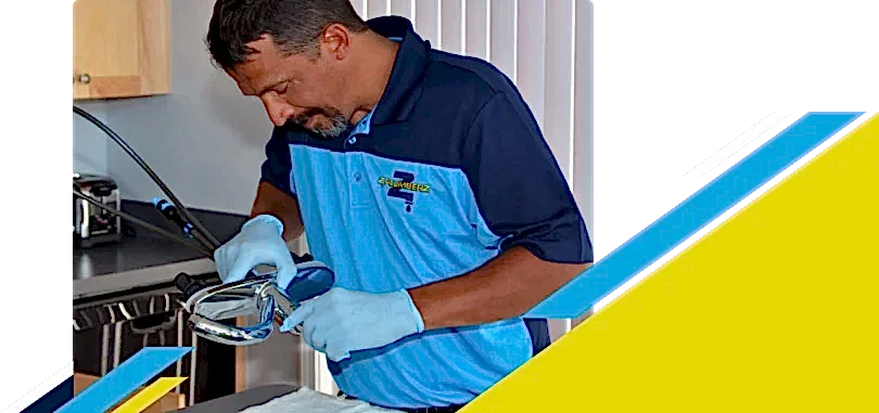 Z PLUMBERZ of Auburn Hills technician inspecting sink faucet assembly