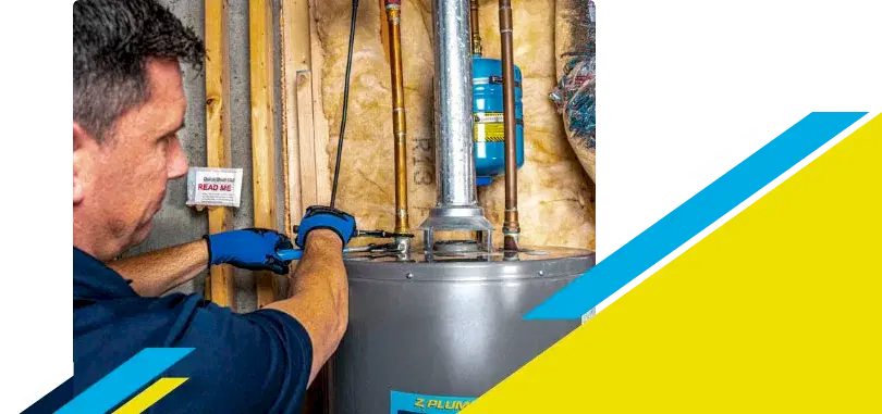 Z PLUMBERZ of Auburn Hills technician fixing water heater