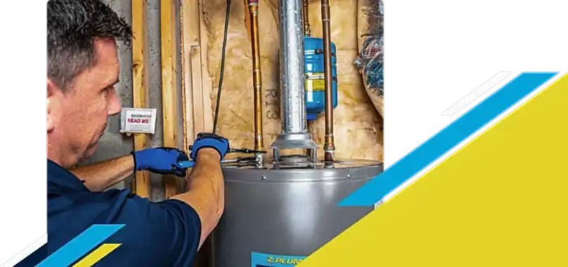 Z PLUMBERZ of North Dallas technician fixing water heater