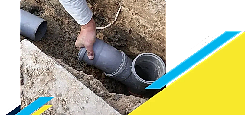 Z PLUMBERZ of North Dallas technician istalling a new sewer pipe