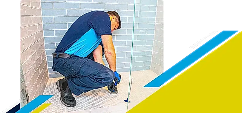 Z PLUMBERZ of North Dallas technician fixing shower drain