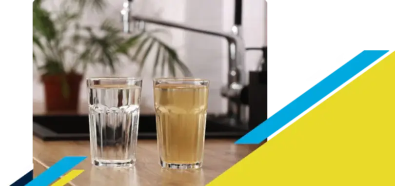Two glasses full of water with one being clean and other dirty