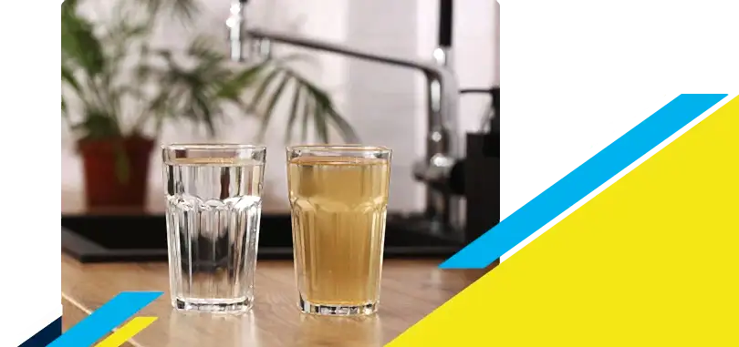 Two glasses full of water with one being clean and other dirty