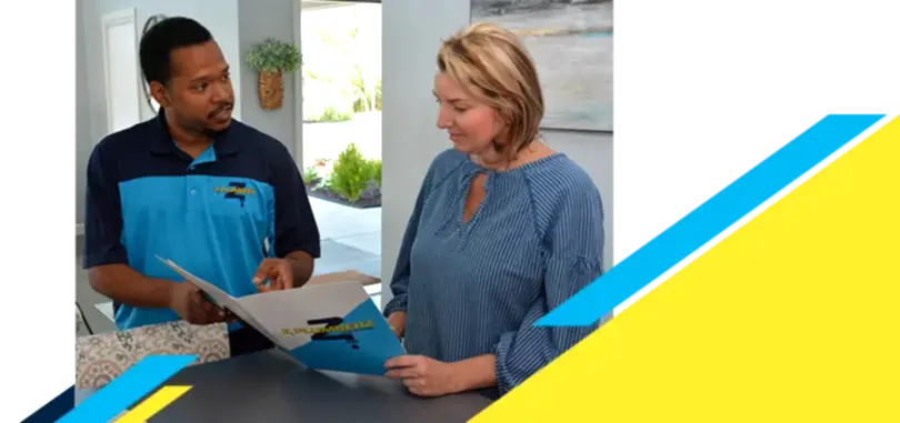Z Plumberz technician talking to a customer