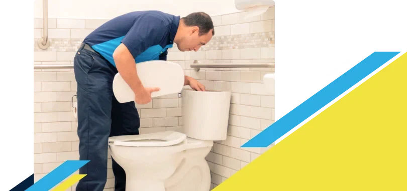 Z PLUMBERZ of New Haven technician inspecting top chamber of a toilet