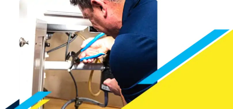 Z PLUMBERZ of New Haven technician fixing pipe under a sink