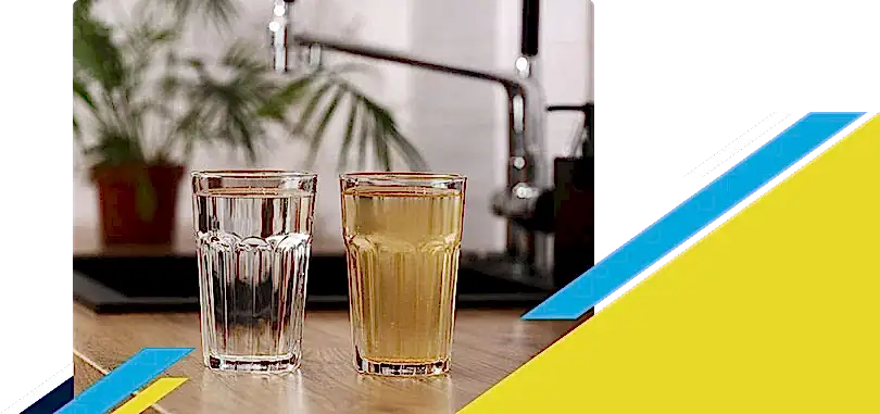 Two glasses full of water with one being clean and other dirty
