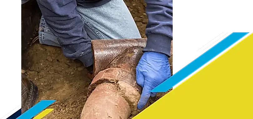 Z PLUMBERZ of Ann Arbor worker inspecting a sewer pipe