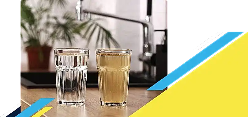 Two glasses full of water with one being clean and other dirty