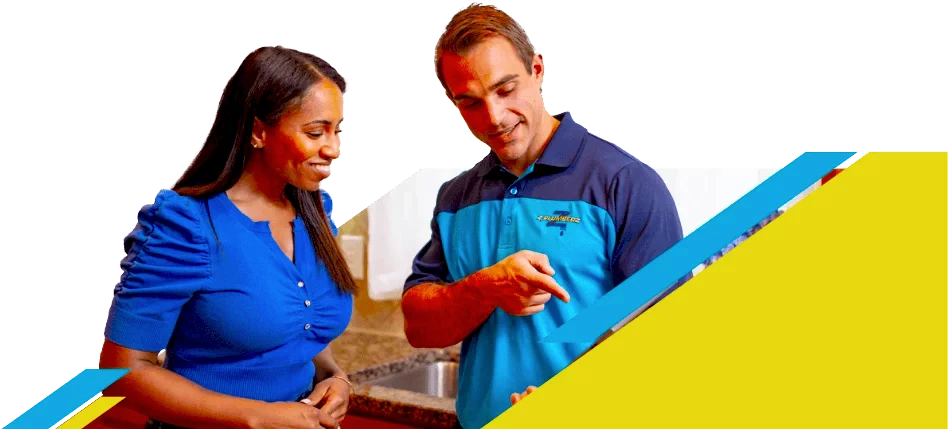 Z PLUMBERZ of North America technician talking to a customer