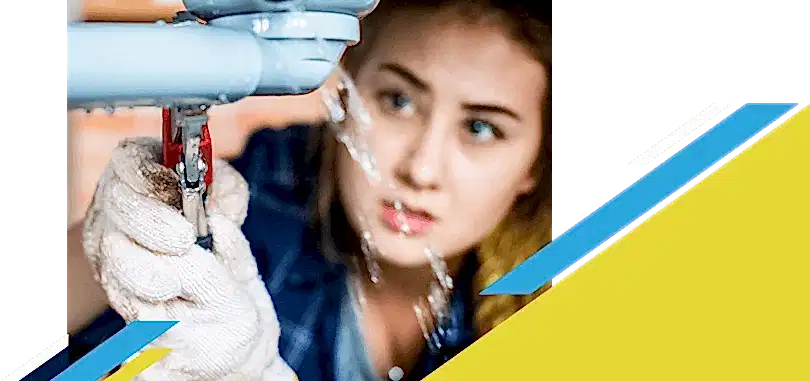 Woman fixing leaking pipe