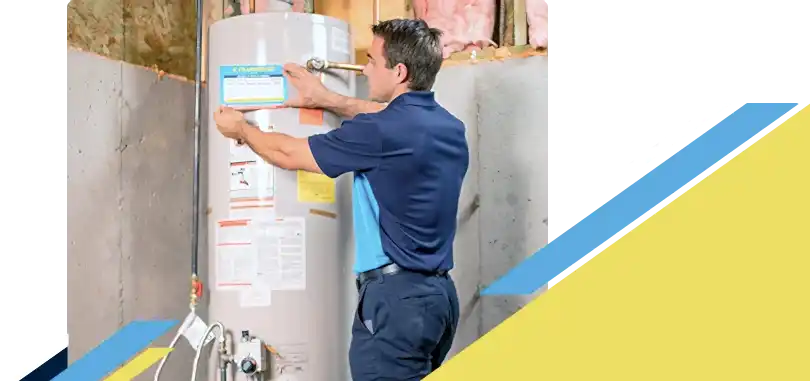Z PLUMBERZ of Greater Boston technician placing label on a water heater