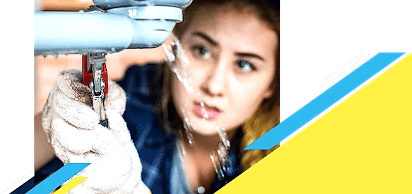 Woman fixing leaking pipe