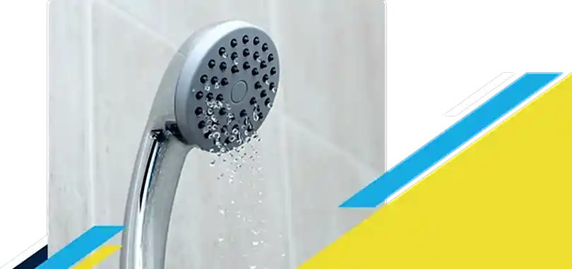 A shower head trickling water