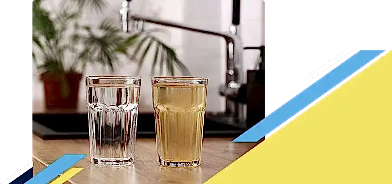Two glasses full of water with one being clean and other dirty