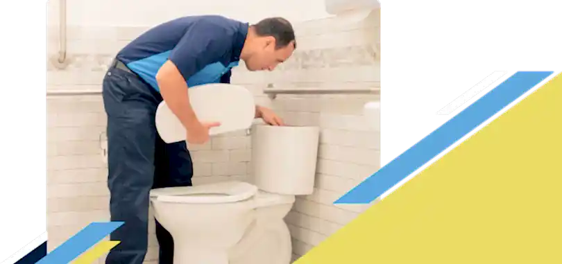 Z PLUMBERZ of Livingston technician inspecting top chamber of a toilet