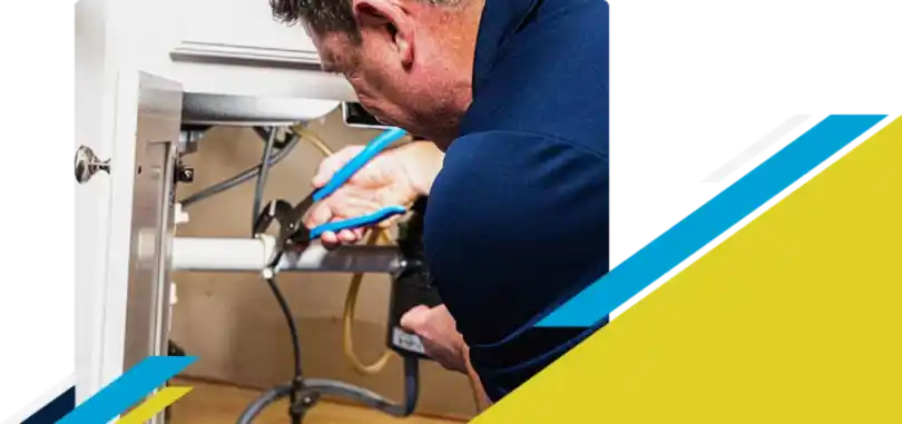 Z PLUMBERZ of Bergen technician fixing pipe under a sink