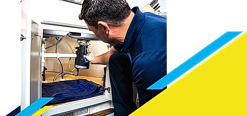 Z PLUMBERZ of Bergen technician fixing garbage disposal