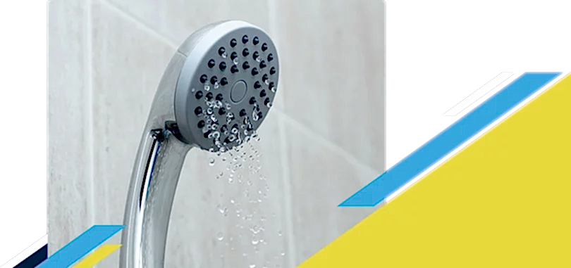 A shower head trickling water