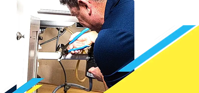 Z PLUMBERZ of Jupiter technician fixing pipe under a sink