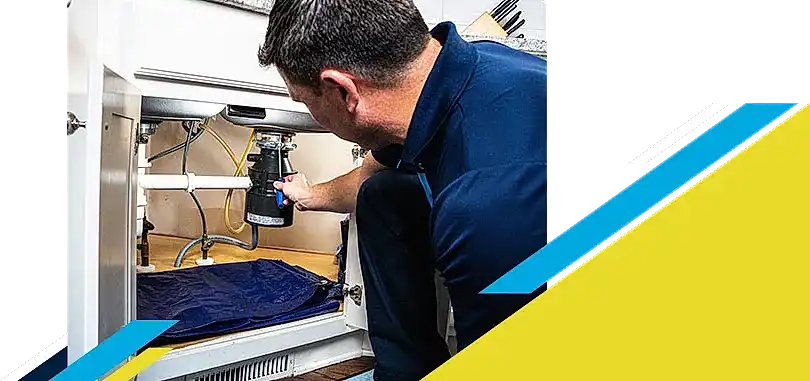 Z PLUMBERZ of Jupiter technician fixing garbage disposal