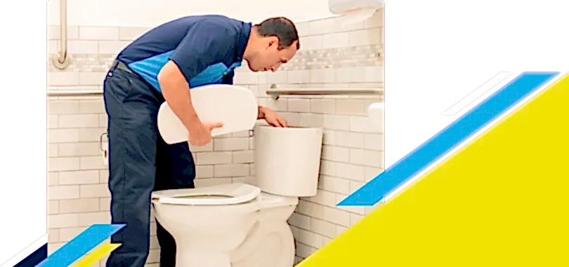 Z PLUMBERZ of East Valley technician inspecting top chamber of a toilet