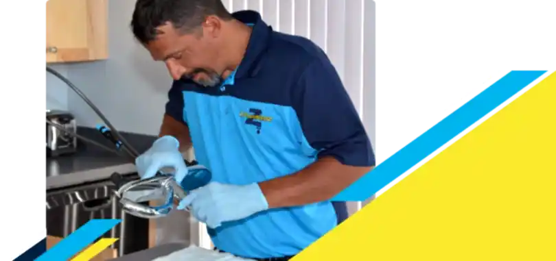 Z PLUMBERZ of East Valley technician inspecting sink faucet assembly