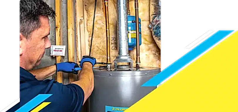 Z PLUMBERZ of Atlanta technician fixing water heater